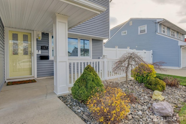 117 Whitman St, Carteret, NJ 07008 - entrance to property featuring a porch and fence