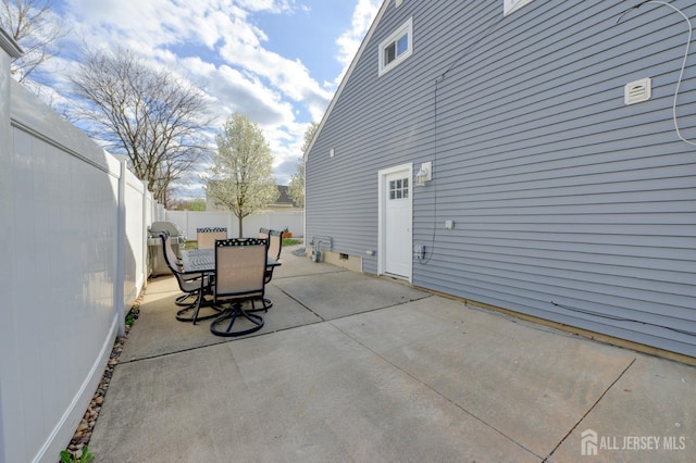 117 Whitman St, Carteret, NJ 07008 - view of patio featuring fence and outdoor dining space