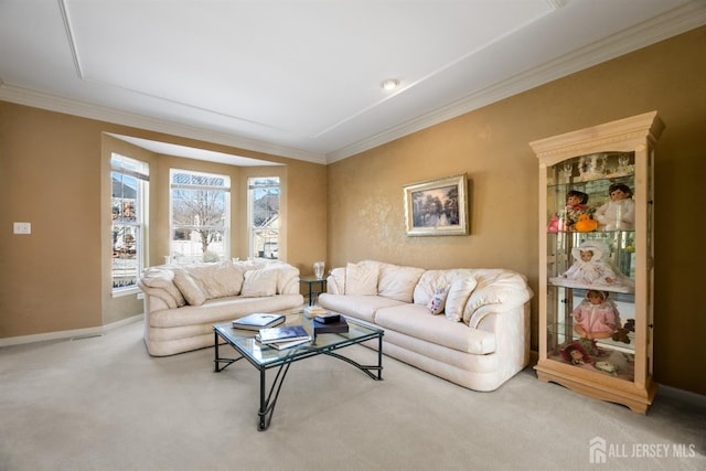 carpeted living room with ornamental molding