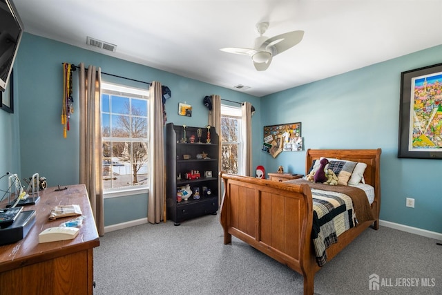 bedroom featuring light carpet and ceiling fan