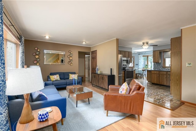 120 Alfred St, Edison, NJ 08820 - living room featuring light wood finished floors, ceiling fan, and ornamental molding