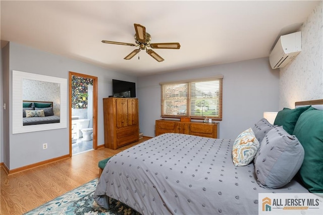 120 Alfred St, Edison, NJ 08820 - bedroom with an AC wall unit, light wood-style flooring, connected bathroom, and ceiling fan