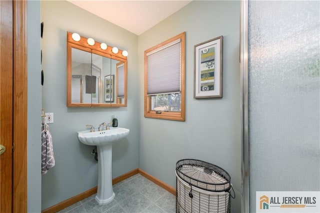 120 Alfred St, Edison, NJ 08820 - bathroom featuring baseboards and a sink