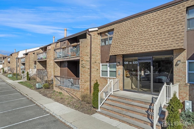 529 Sharon Garden Ct, Woodbridge Proper, NJ 07095 - view of building exterior featuring uncovered parking