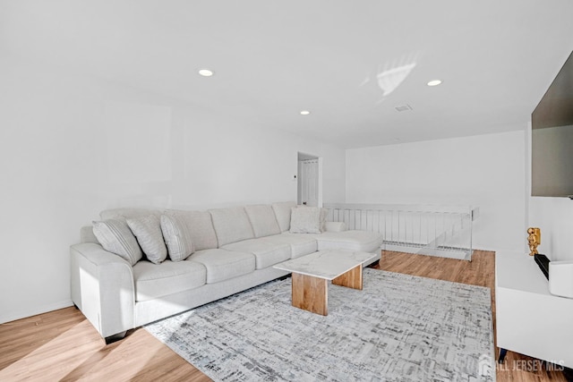 529 Sharon Garden Ct, Woodbridge Proper, NJ 07095 - living room featuring wood finished floors and recessed lighting