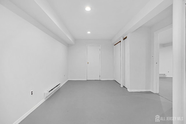 529 Sharon Garden Ct, Woodbridge Proper, NJ 07095 - unfurnished room with a baseboard heating unit and recessed lighting