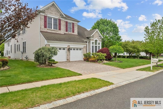 103 Einstein Way E, Windsor, NJ 08512 - traditional home featuring driveway, an attached garage, a front lawn, and roof with shingles