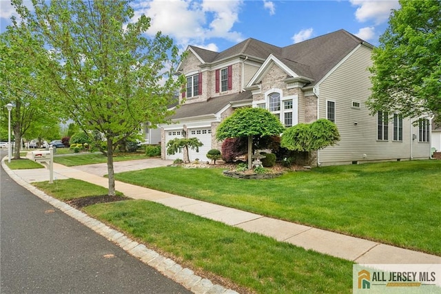 view of front of property with stone siding, a garage, driveway, and a front yard