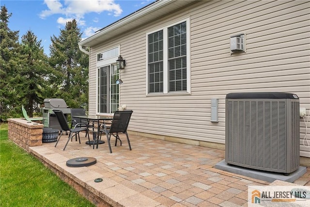 103 Einstein Way E, Windsor, NJ 08512 - view of patio / terrace featuring central AC unit and outdoor dining space