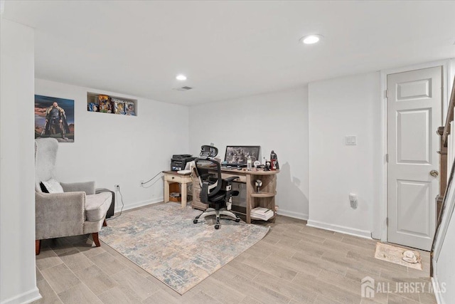 home office with recessed lighting, baseboards, visible vents, and light wood-style flooring