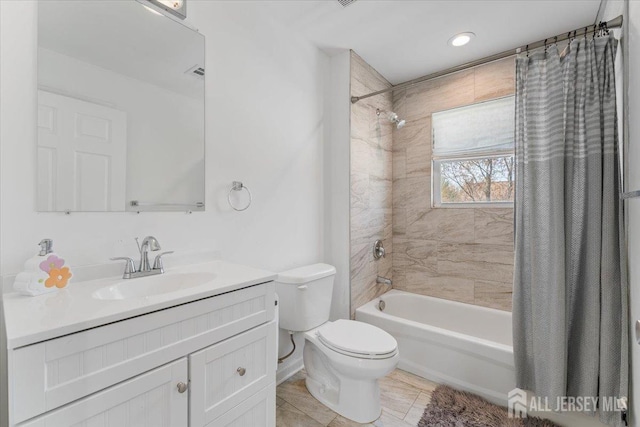 full bath with vanity, shower / bathtub combination with curtain, tile patterned floors, and toilet