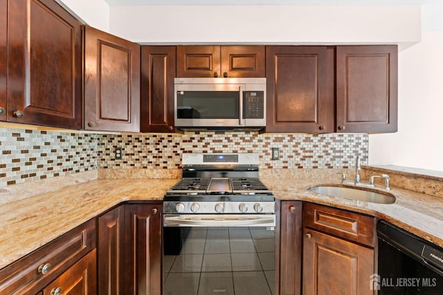 26 Allison Ct, South Brunswick, NJ 08852 - kitchen with appliances with stainless steel finishes, tile patterned floors, tasteful backsplash, and light stone counters