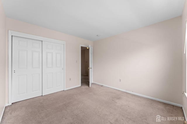 26 Allison Ct, South Brunswick, NJ 08852 - unfurnished bedroom with carpet floors, baseboards, and a closet