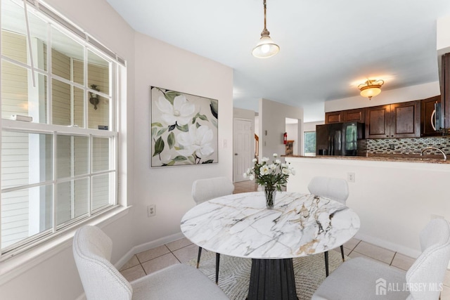 26 Allison Ct, South Brunswick, NJ 08852 - dining room with light tile patterned floors and healthy amount of natural light