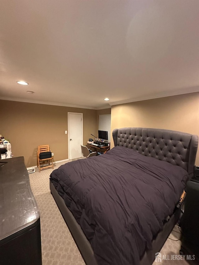 carpeted bedroom with ornamental molding, recessed lighting, and baseboards
