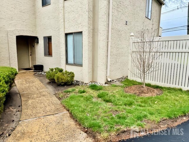 29 Gate House Ln, Edison, NJ 08820 - view of property exterior with stucco siding