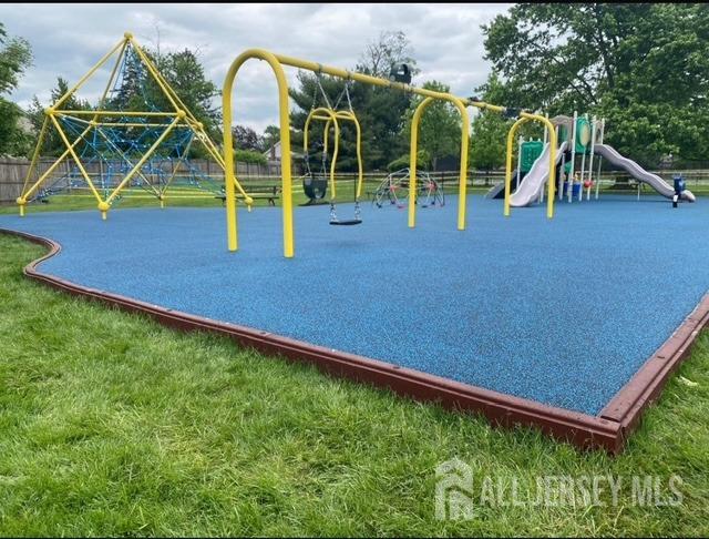 community playground featuring fence