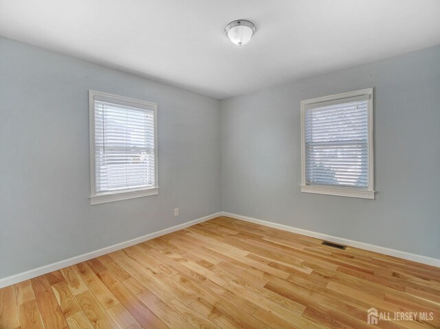 empty room featuring light hardwood / wood-style flooring