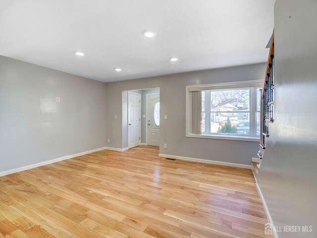 entrance foyer with light hardwood / wood-style floors