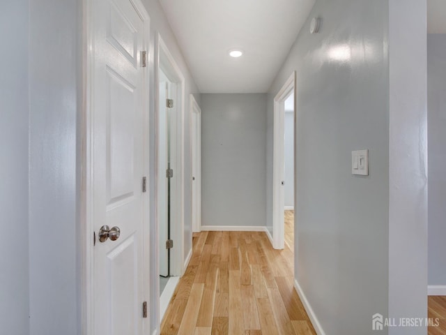 hall featuring light hardwood / wood-style floors