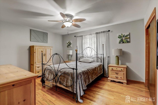 12 Euclid Rd, South Amboy, NJ 08879 - bedroom with light wood-style flooring and a ceiling fan