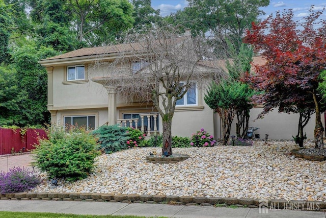 12 Euclid Rd, South Amboy, NJ 08879 - view of front of home featuring stucco siding and a chimney