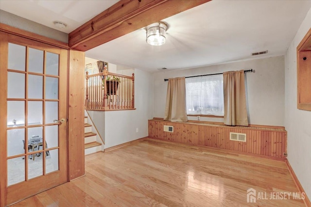 12 Euclid Rd, South Amboy, NJ 08879 - spare room featuring wood finished floors, a smoke detector, and stairway