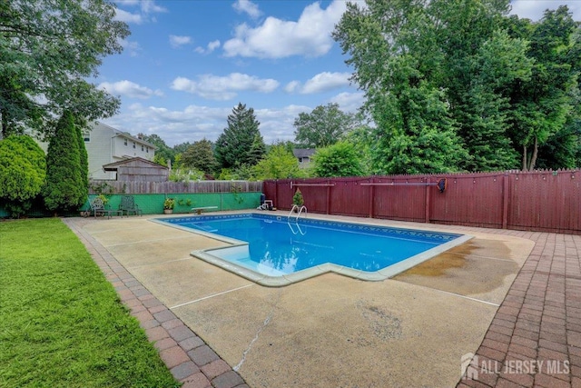 12 Euclid Rd, South Amboy, NJ 08879 - view of swimming pool with a patio, a fenced backyard, and a diving board