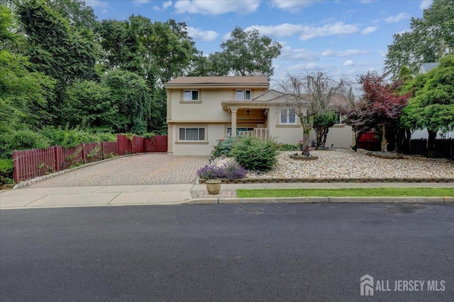 12 Euclid Rd, South Amboy, NJ 08879 - tri-level home featuring stucco siding and driveway