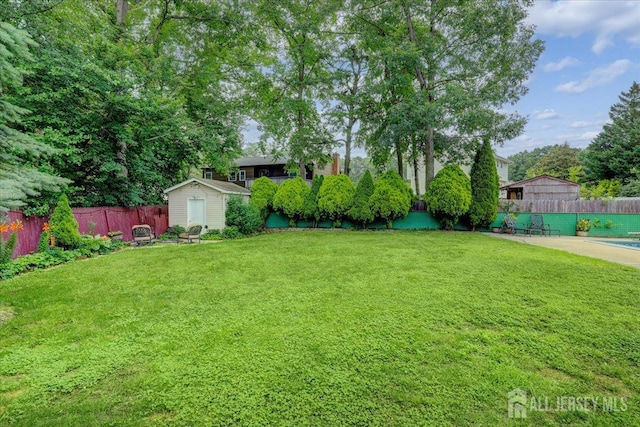 12 Euclid Rd, South Amboy, NJ 08879 - fenced backyard featuring a storage shed