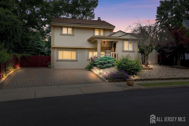 12 Euclid Rd, South Amboy, NJ 08879 - view of front of home with stucco siding and driveway