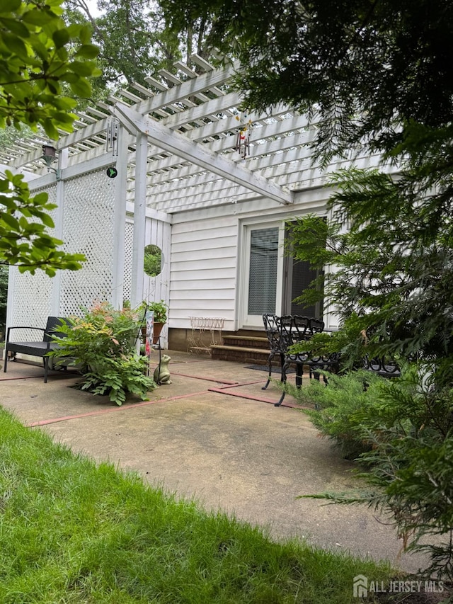 13 Concord St, Edison, NJ 08820 - back of property featuring a pergola, entry steps, and a patio