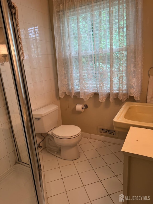 13 Concord St, Edison, NJ 08820 - full bathroom featuring tile patterned floors, a stall shower, and vanity