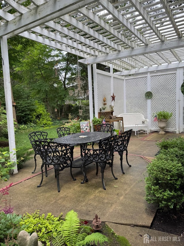 13 Concord St, Edison, NJ 08820 - view of patio / terrace with outdoor dining area and a pergola