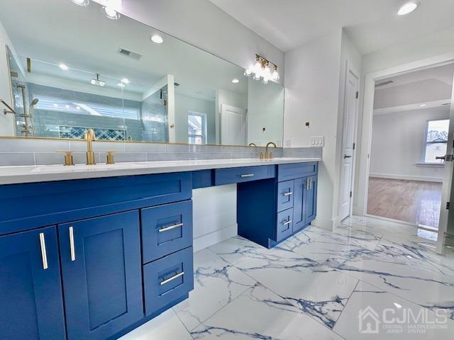 9 Melrose Ave, Sayreville, NJ 08879 - bathroom with recessed lighting, a sink, a shower stall, and double vanity