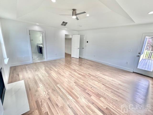 9 Melrose Ave, Sayreville, NJ 08879 - unfurnished bedroom featuring light wood-style flooring, ceiling fan, baseboards, ensuite bath, and visible vents