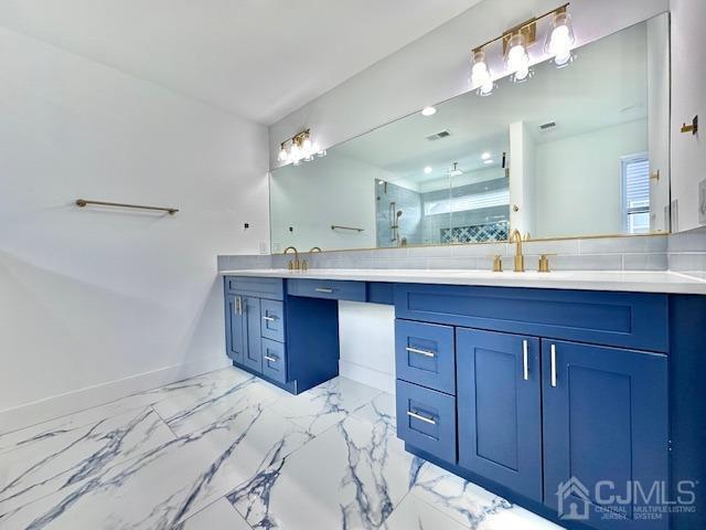 9 Melrose Ave, Sayreville, NJ 08879 - full bathroom featuring walk in shower, marble finish floor, a sink, and double vanity