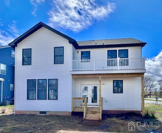 9 Melrose Ave, Sayreville, NJ 08879 - rear view of house featuring french doors and a balcony