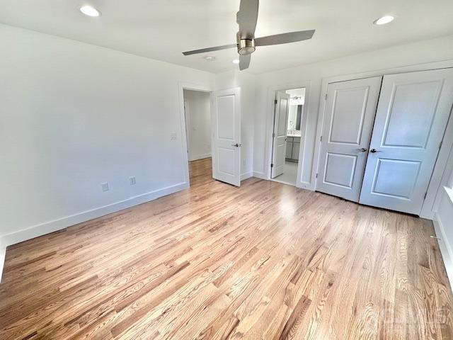 9 Melrose Ave, Sayreville, NJ 08879 - unfurnished bedroom with ensuite bathroom, a closet, light wood finished floors, baseboards, and recessed lighting