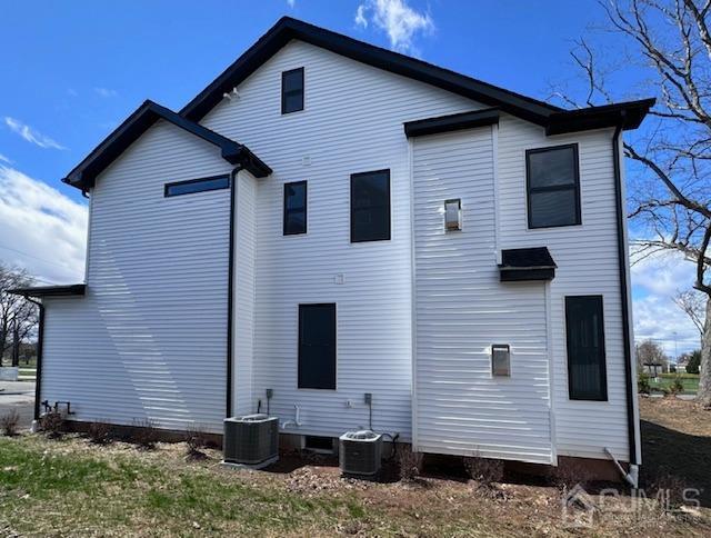 9 Melrose Ave, Sayreville, NJ 08879 - rear view of house featuring cooling unit