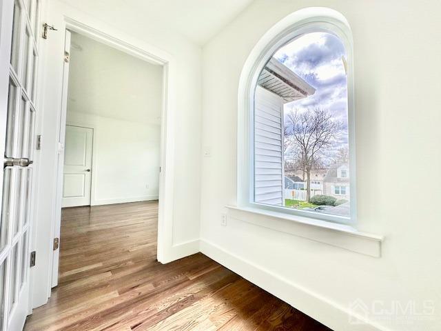 9 Melrose Ave, Sayreville, NJ 08879 - unfurnished dining area with wood finished floors and baseboards