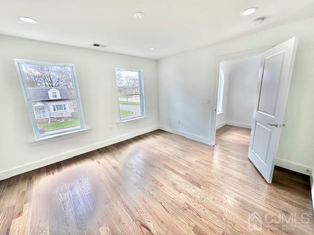 9 Melrose Ave, Sayreville, NJ 08879 - unfurnished room with recessed lighting, light wood-style flooring, visible vents, and baseboards
