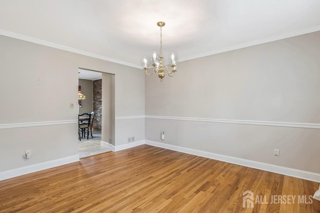 318 Ambrose Ave, Middlesex, NJ 08846 - empty room with a chandelier, light wood-type flooring, and ornamental molding