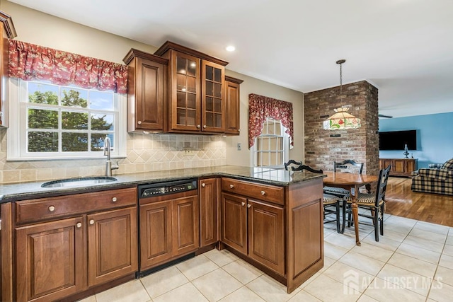 318 Ambrose Ave, Middlesex, NJ 08846 - kitchen with dishwasher, a peninsula, dark stone countertops, backsplash, and open floor plan