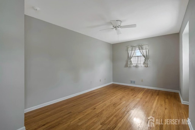 318 Ambrose Ave, Middlesex, NJ 08846 - empty room featuring ceiling fan, wood finished floors, and a smoke detector