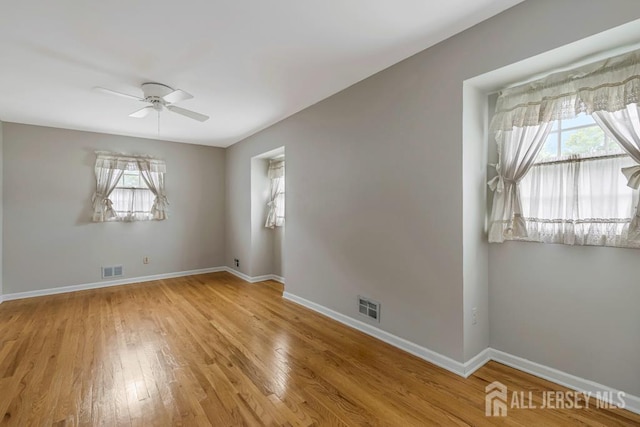 318 Ambrose Ave, Middlesex, NJ 08846 - unfurnished room with plenty of natural light, a ceiling fan, and light wood-style flooring