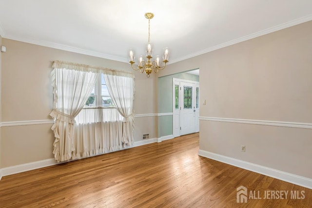 318 Ambrose Ave, Middlesex, NJ 08846 - unfurnished room featuring a chandelier, wood finished floors, and ornamental molding