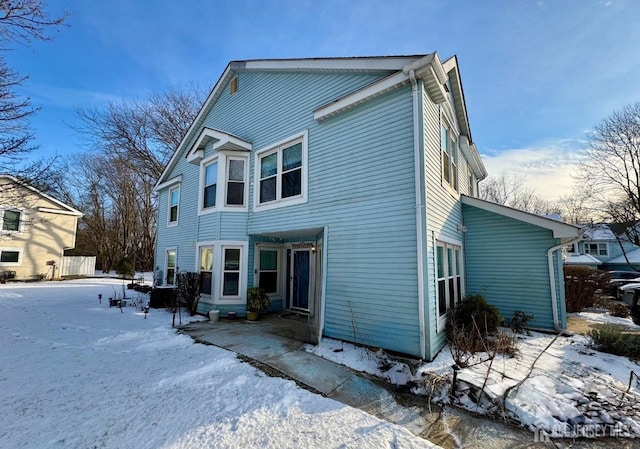 view of snow covered property