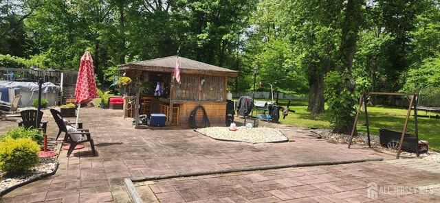95 Gravel Hill-Spotswood Rd, Monroe, NJ 08831 - view of patio / terrace with view of wooded area
