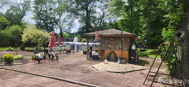 95 Gravel Hill-Spotswood Rd, Monroe, NJ 08831 - view of patio with view of wooded area